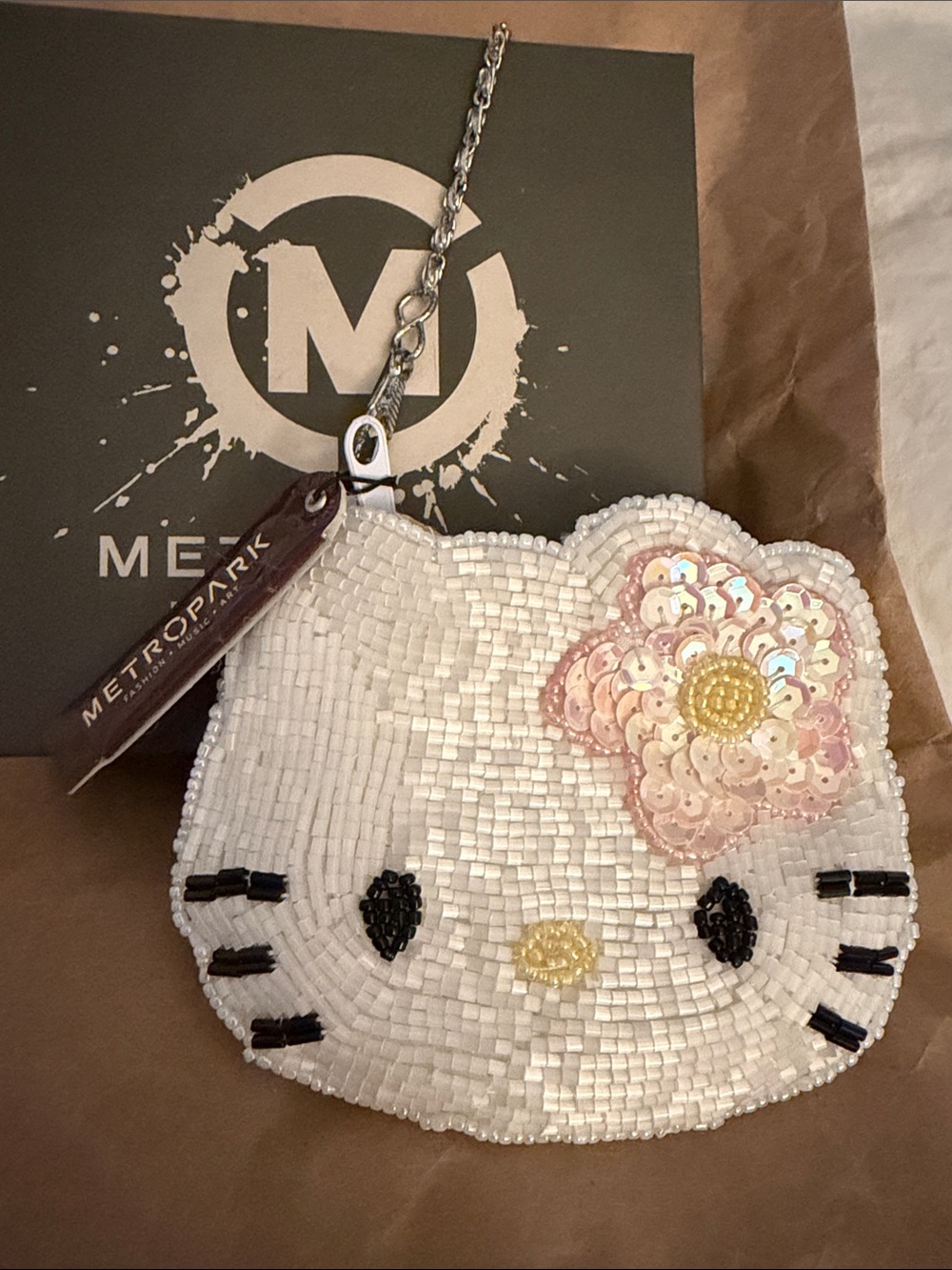 Vintage Hello Kitty coin purse with wristlet chain. Never used.